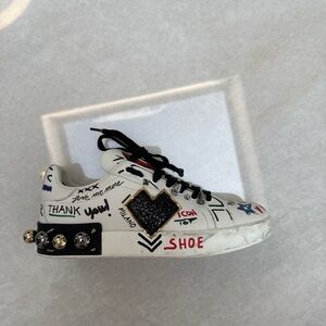 Designer White Sneakers with Black Accents